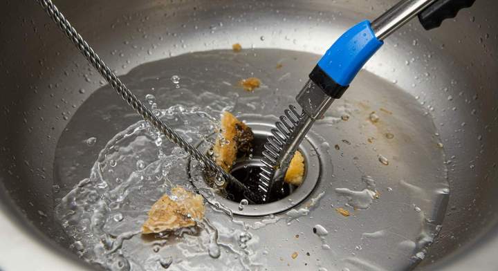 déboucher une canalisation